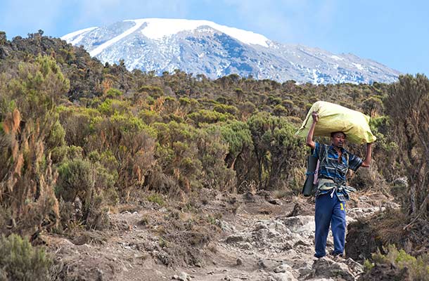 Kilimanjaro Porters: Help Them Help You Up The Mountain