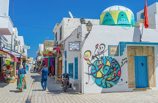 A colorful market street in Tunisia.