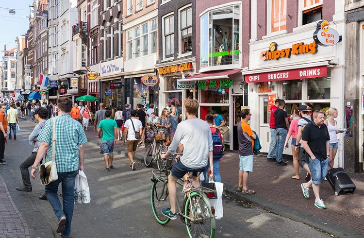 A pedestrian shopping street in central Amsterdam.