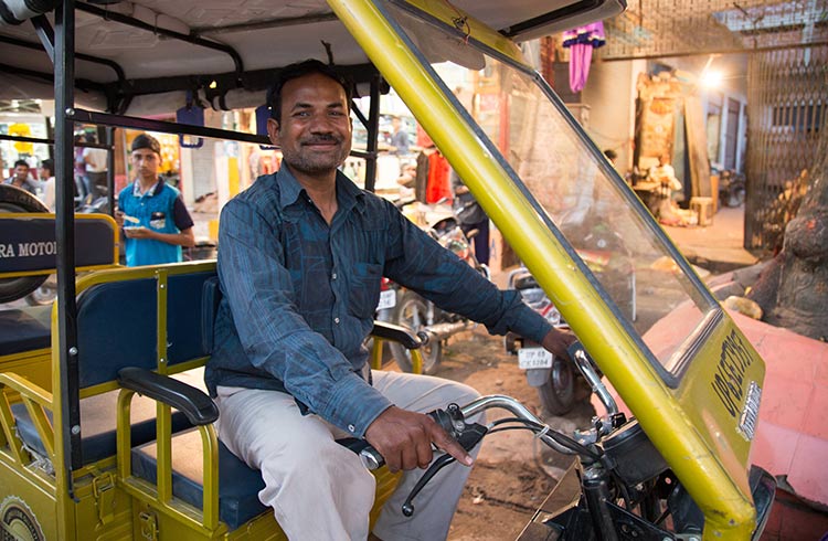 A tuk-tuk driver in India.