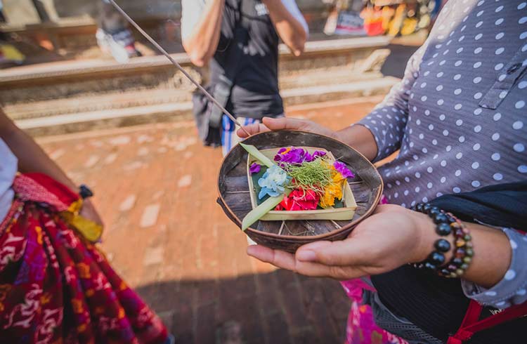 Offering a blessing in Indonesia.