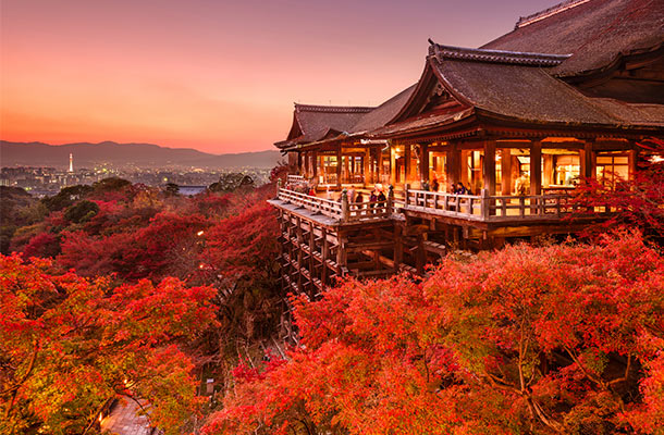 Kiyomizudera Temple in Kyoto during fall at dusk.