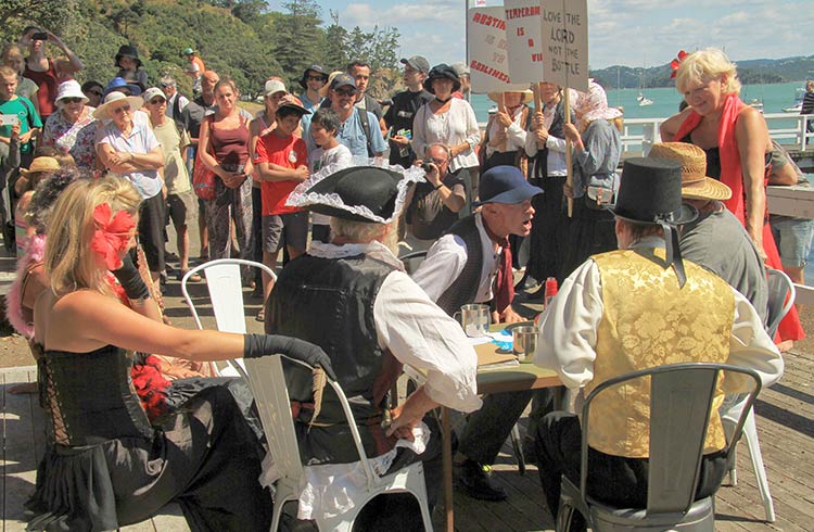 A street theatre re-enactment takes place on the waterfront of Russell each January.