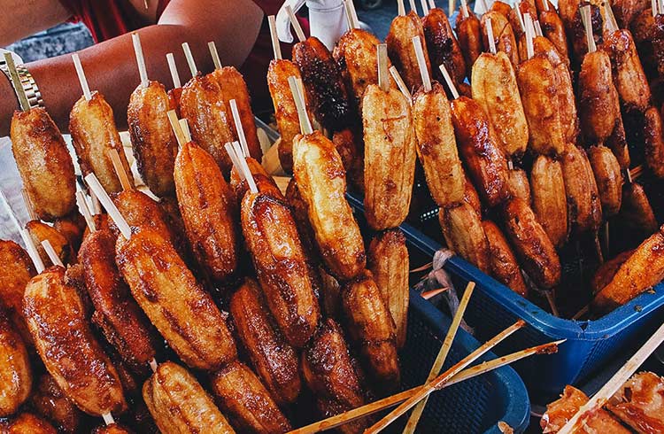 Banana Q, a skewered deep-fried sweet plantain coated in caramelized brown sugar.