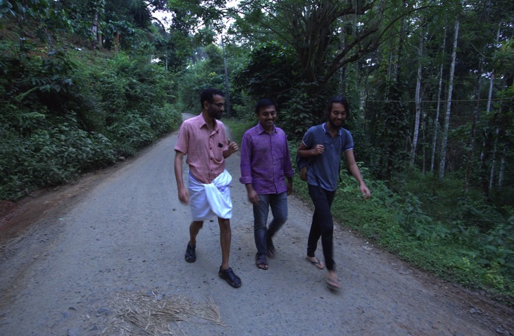Jigar walking with Sumesh and other Kabani staff member