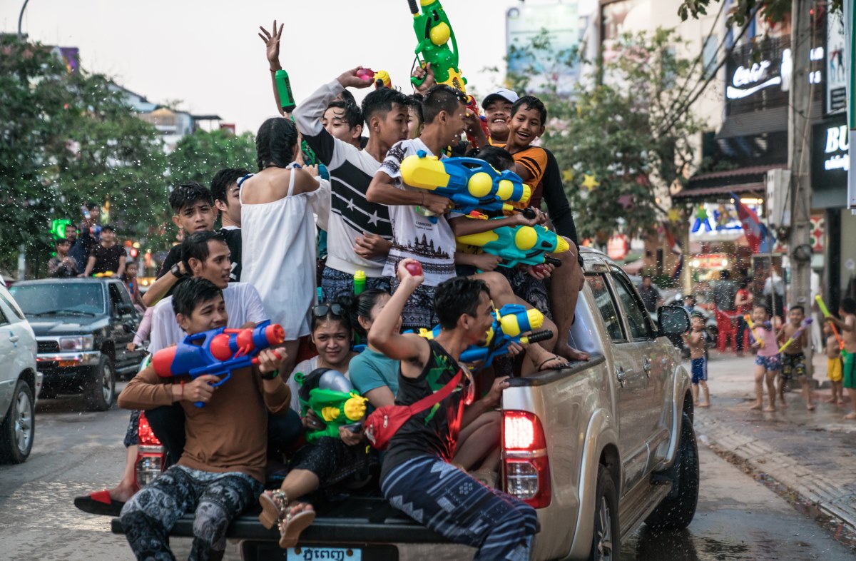 Teams equipped with water pistols and balloons descend on the streets of Siem Reap.