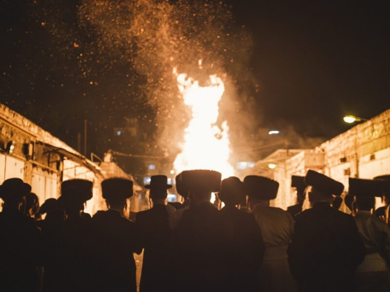 Ultra-Orthodox people pray in front of a huge bonfire during the celebration of Lag BaOmer, a sacred feast that belongs to Jewish mysticism.