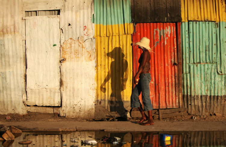 A woman walking the streets of Haiti