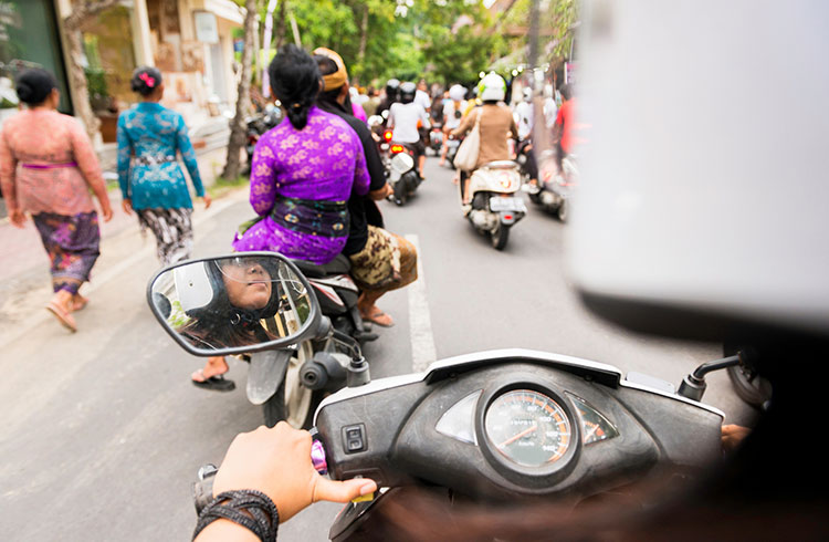 Riding a motorbike through Ubud in rush hour