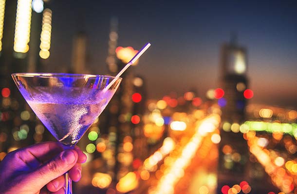 A martini with the backdrop of Dubai