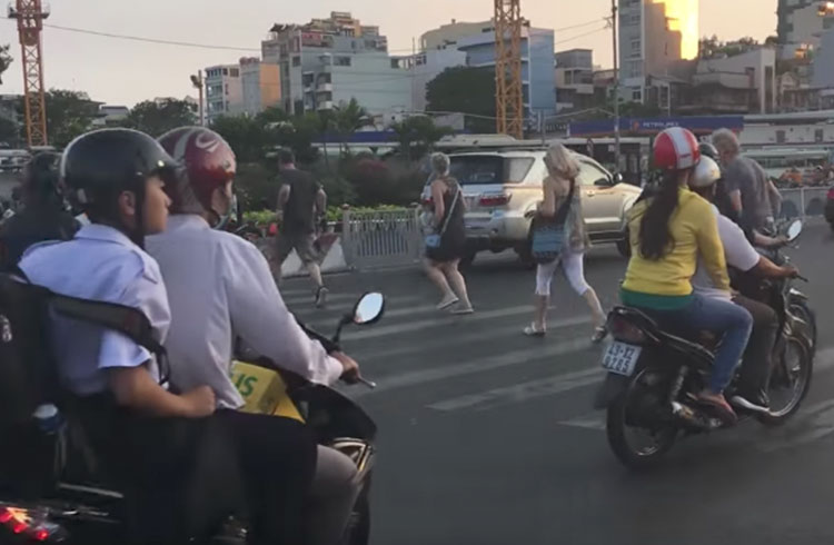 WATCH: Crossing Ho Chi Minh's Notoriously Busy Roads