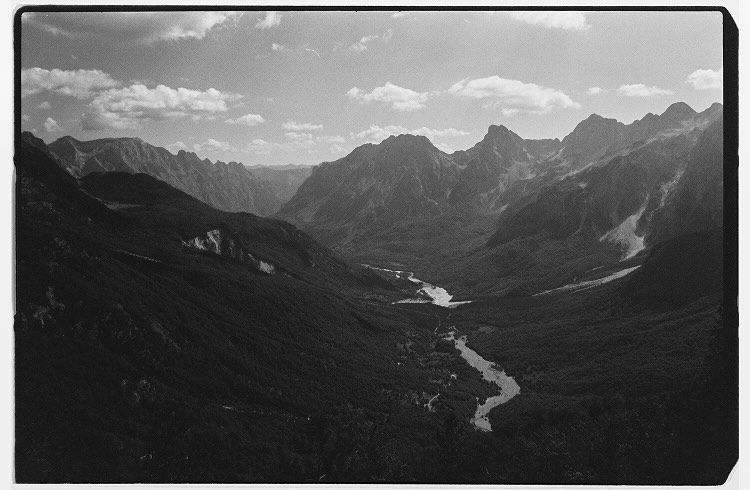 A river flowing between Albanian mountain peaks