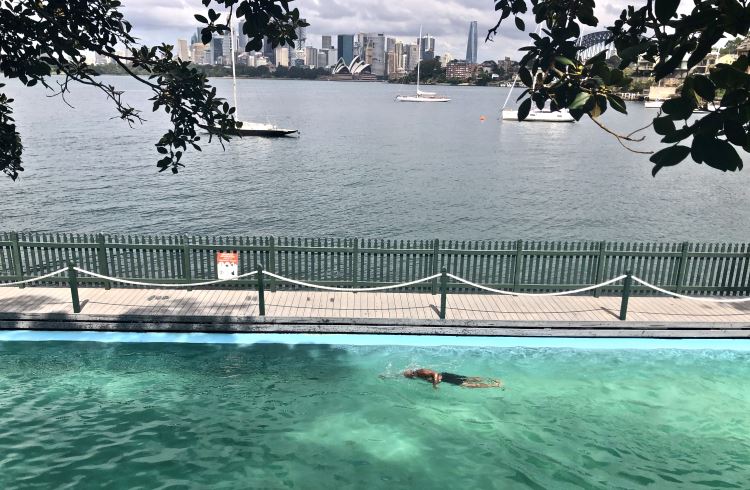 A man swims at Maccallum Pool, on Sydney Harbor at Cremorne Point.