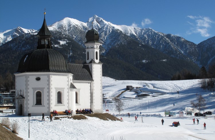 Snowy cross-country skiing trails near the alpine town of Seefeld, Austria. 