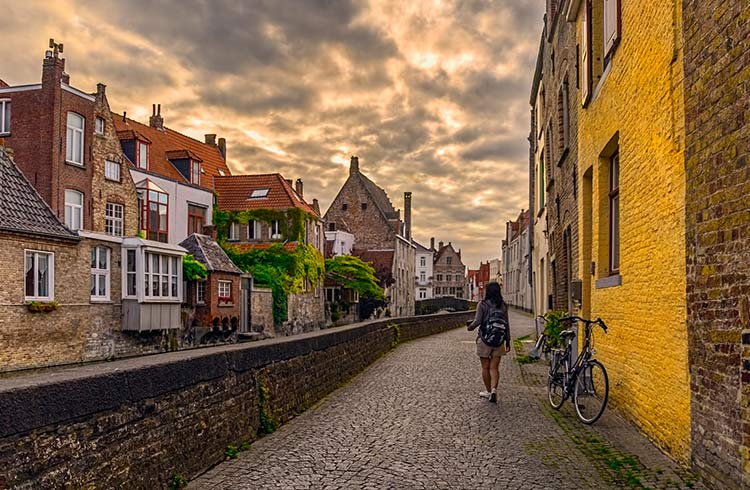 Walking the streets of Bruges in Belgium at sunset