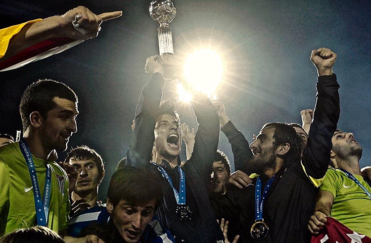 Victorious players raise the cup at the 2016 CONIFA World Cup in Abkhazia.