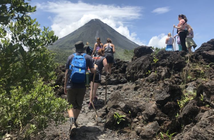 A group of hikers near Arenal Volcano in Ecuador.