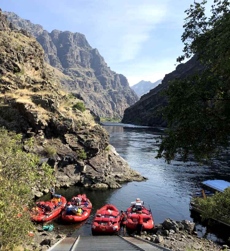 River rafts being loaded for a multi-day whitewater rafting trip on the Snake River in Idaho.