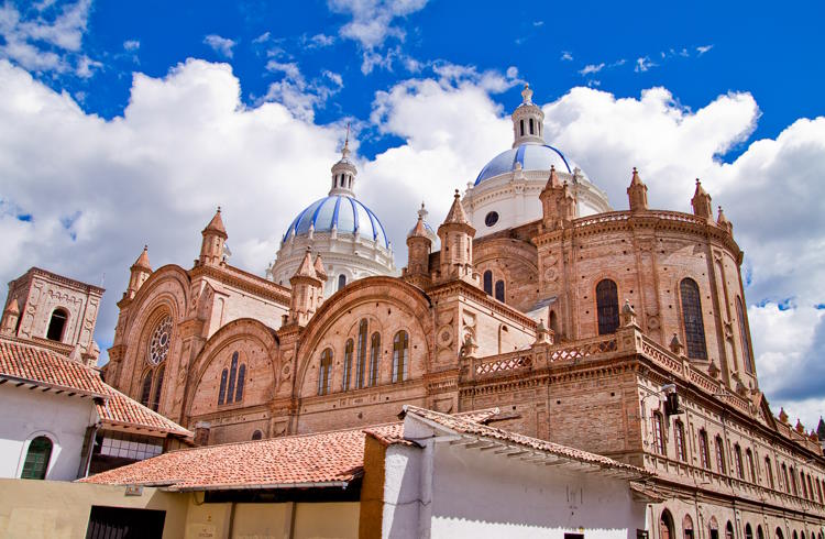 The iconic blue domes of the New Cathedral in Cuenca, Ecuador.