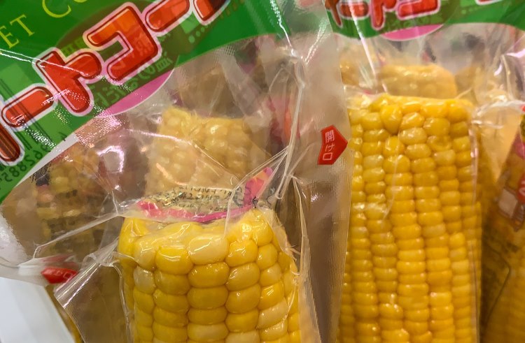 Cooked corn, individually wrapped in plastic, offered for sale in Japan.