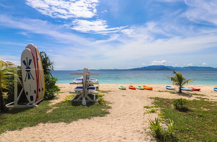 Surfboards on a beach in Fiji.