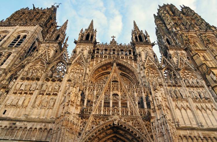 The impressive facade of the Gothic cathedral of Rouen.
