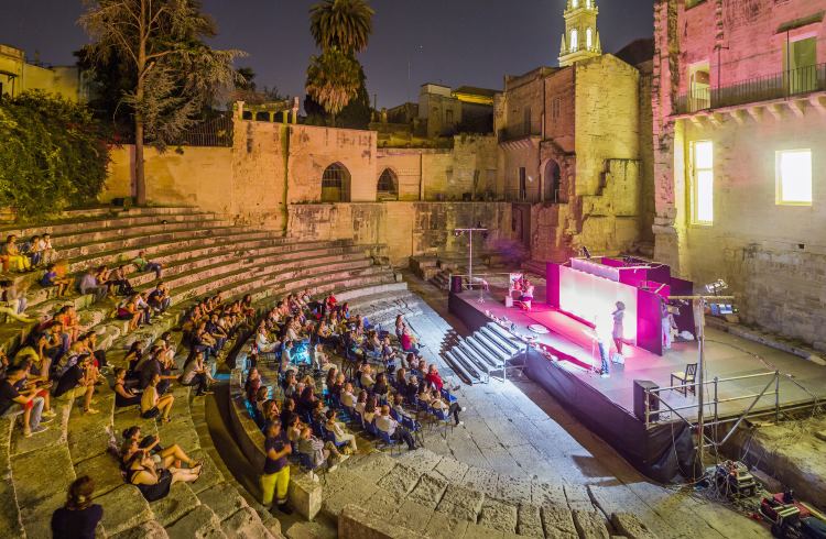 A nighttime theater performace at the ancient Roman amphitheater in Lecce, Italy.