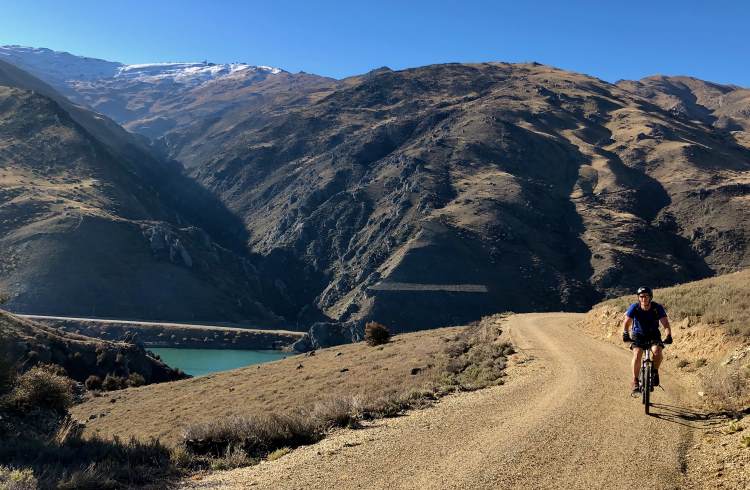 A cyclist rides along the Dunstan Cycle Trail in Central Otago, New Zealand. 