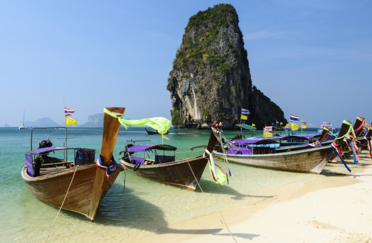 Longtail boats on Railay Beach, Thailand. 