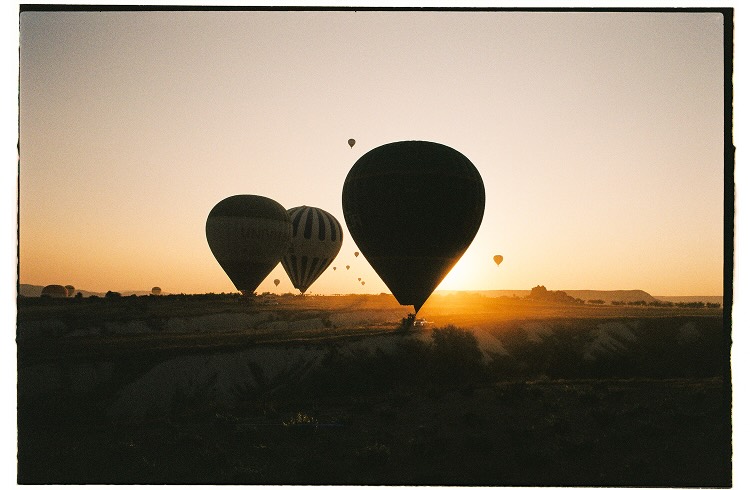 Fishing rods line the Galata bridge as the city hums around them.