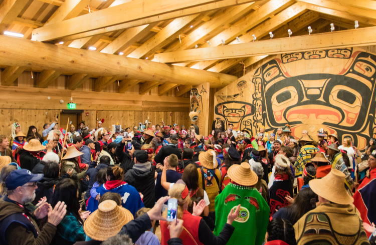 Interior of the Huna Tribal Longhouse in Glacier Bay National Park during the dedication ceremony.
