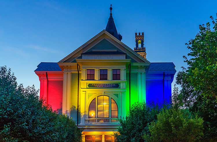 Rainbow-colored lights on Town Hall, Provincetown, Massachusetts.