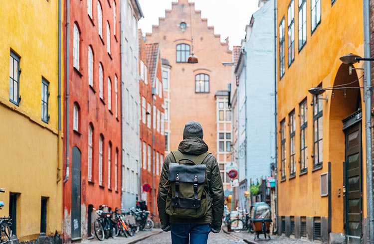 Man walking in colorful Copenhagen street