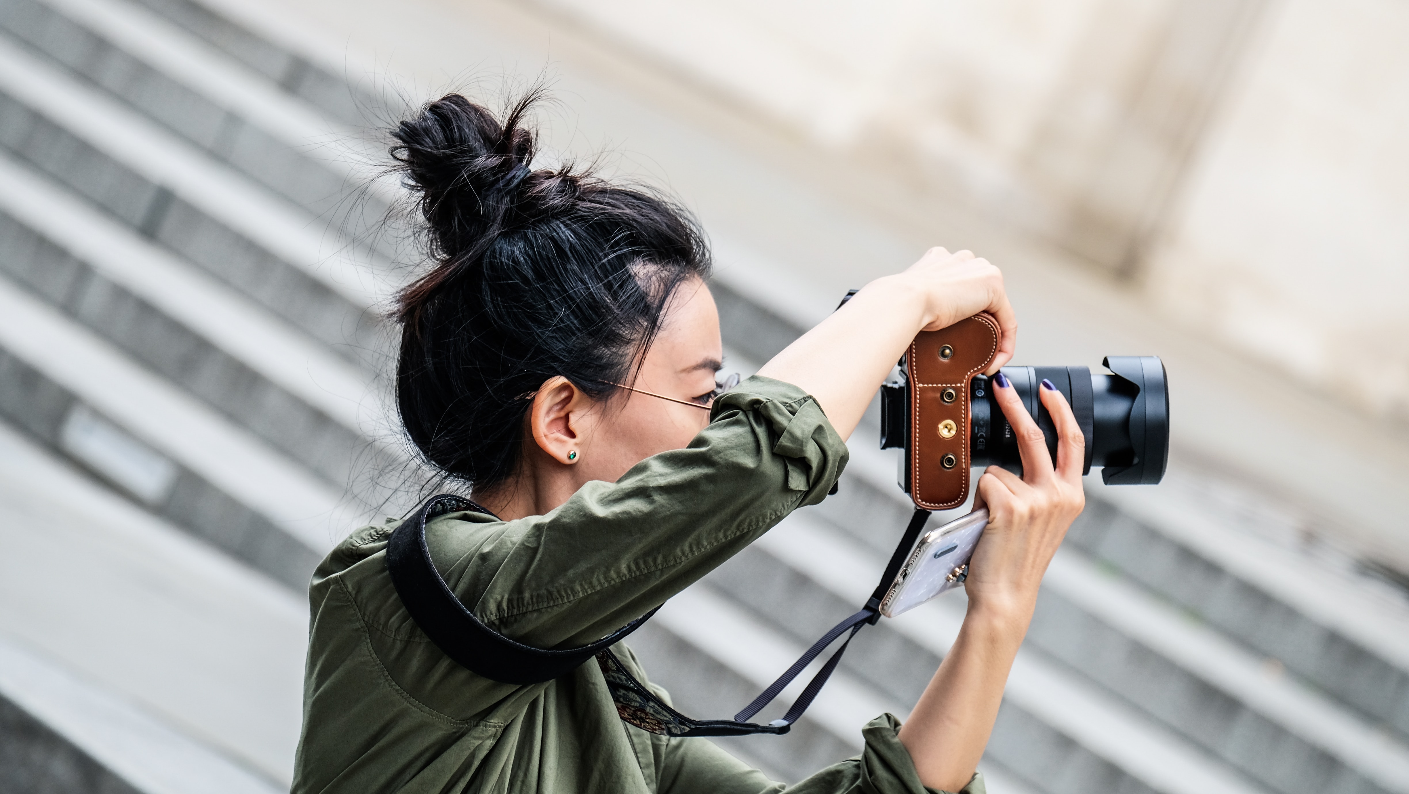 A woman photographer on a shoot