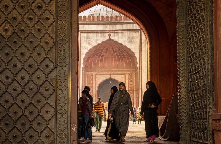 Women in doorway of Jama Masjid, New Delhi