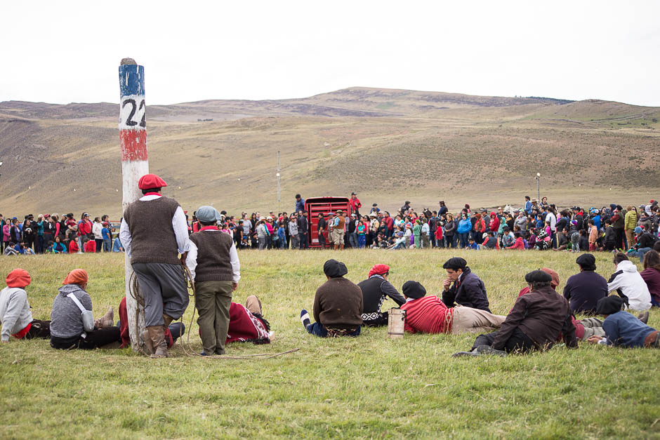 The Jineteadas, is a celebration part of the gaucho culture (local cowboys) done during the summer in various locations of Patagonia (Chilean and Argentinean). In the pict: People from de small Villa Cerro Castillo (449 hab) and it’s sorroundings congregate waiting for the first activity of the day