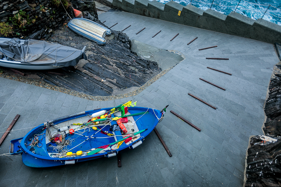 During the winter months, the boats are pulled out of the water and stored throughout the cities in the Cinque Terre area.  This boat sits on the steep walkway that leads to the waters edge.