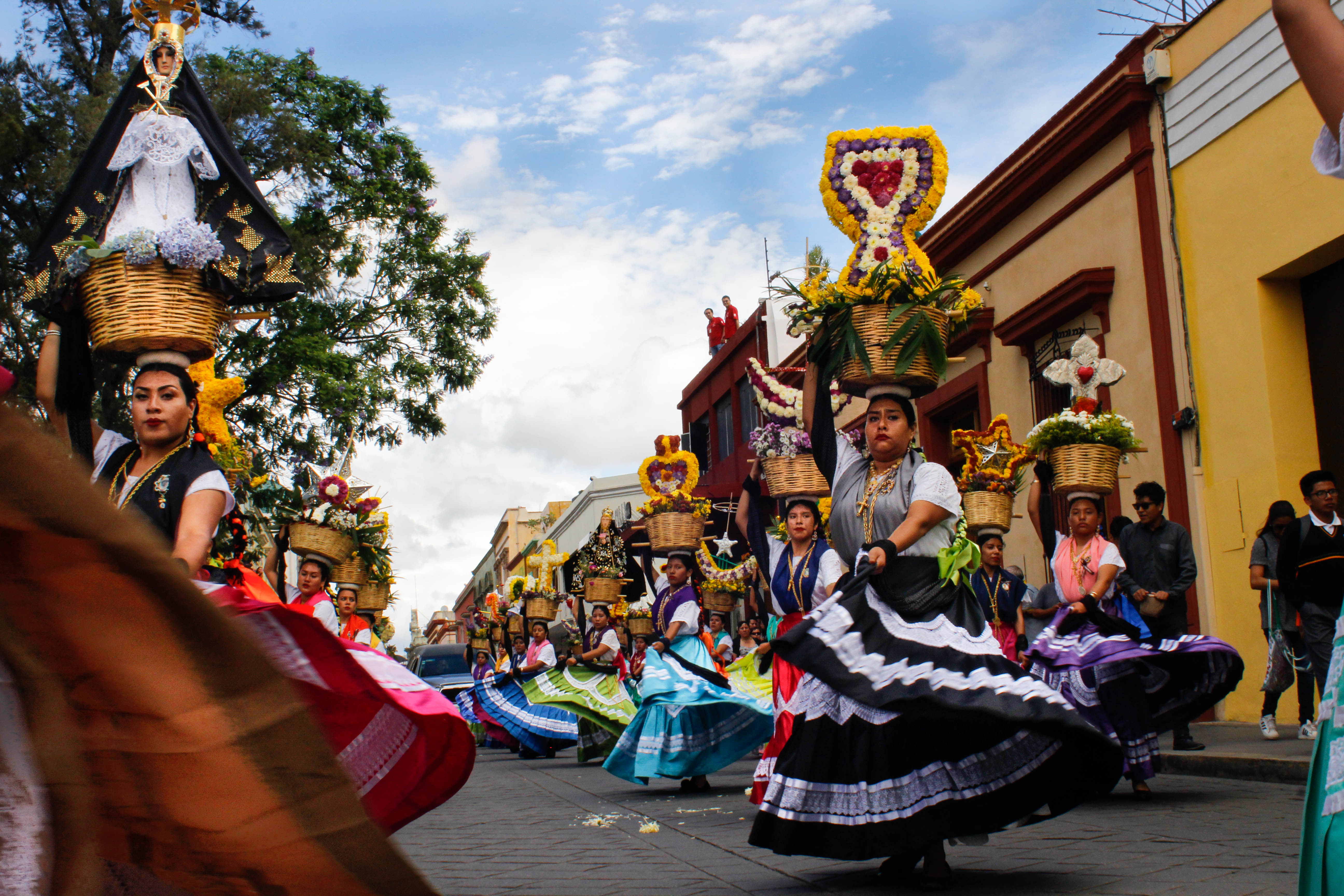 Funeral procession in Oaxaca. In some traditional places in Mexico, when someone dies, the whole neighborhood marches with the coffin to honor death.