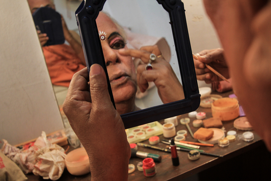 Makeover: An act of transformation mastered over 65 years, achieved over 2 hours of patient yet swift work with makeup colours, brushes and a mirror. As the idea of gender becomes fluid in his few simple strokes, I imagine the changing faces that he’d have seen in his reflections over the years. 
