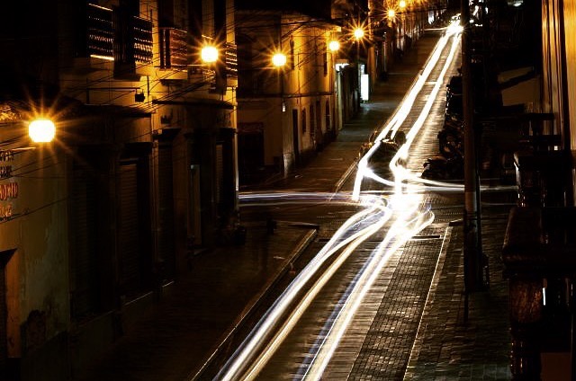 Cars give light to a once capital of the Inca Empire.