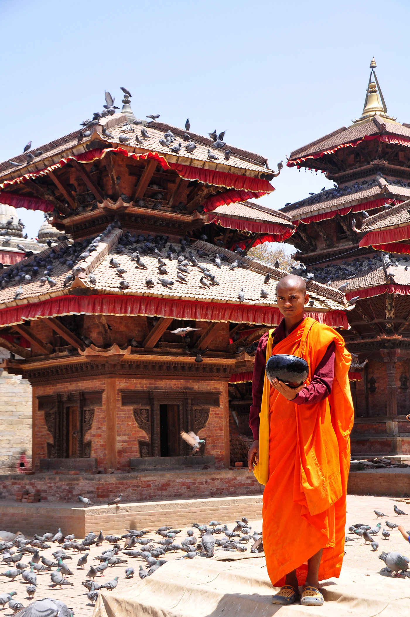 Monks meditate in Durbar Square as you prepare for a trip into the Himalayas.