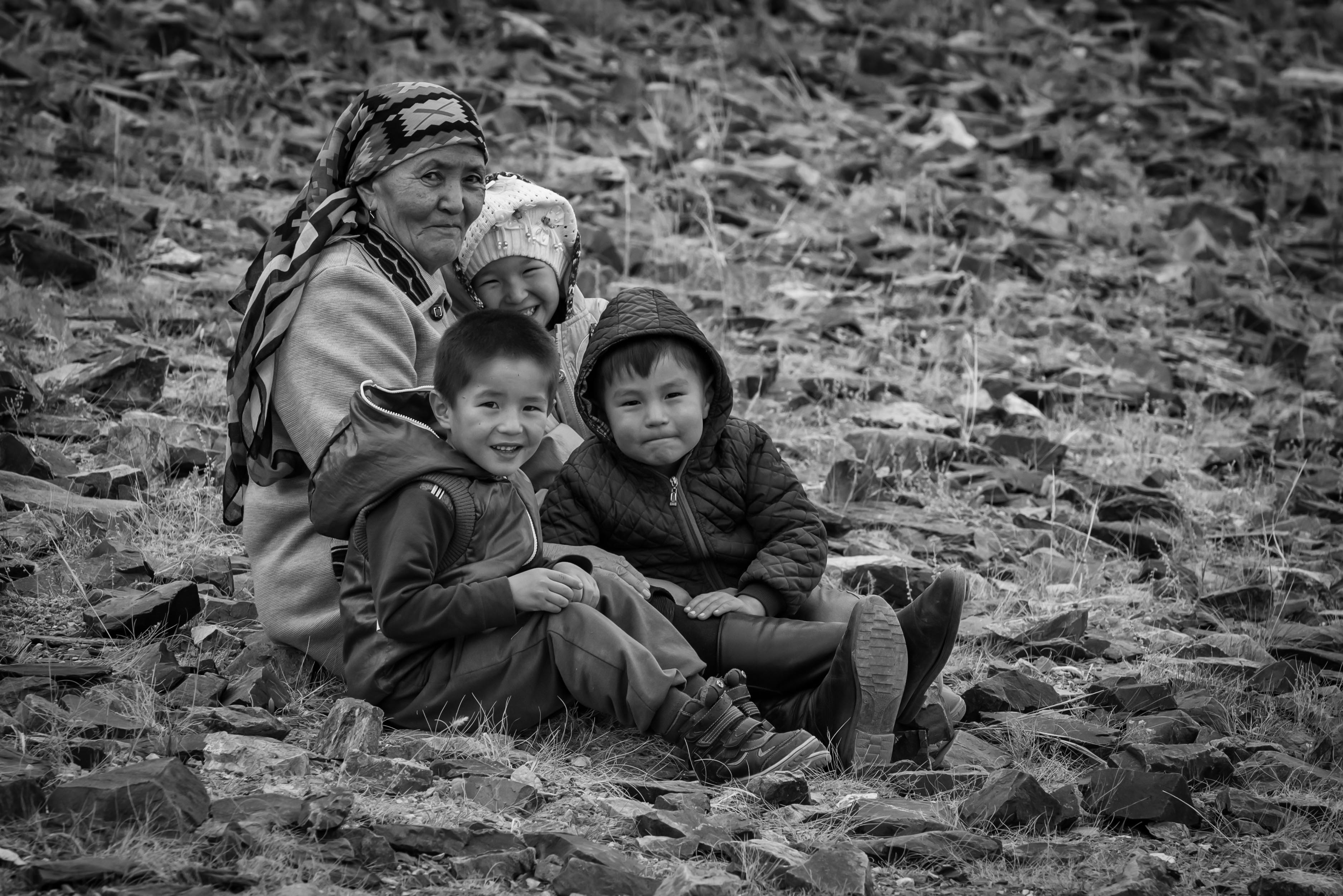 Spectators of the Golden Eagle Festival include young and old, demonstrating the support of all family members who must survive on this tradition for food and warmth in the harsh Mongolian winters.