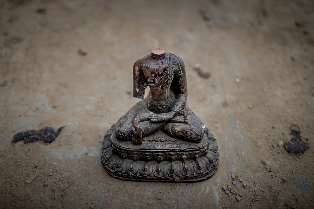 A Buddha statue is broken due to earthquake in Swayambhunath Temple, Swayambhu, Kathmandu, Nepal. May 4, 2015.
