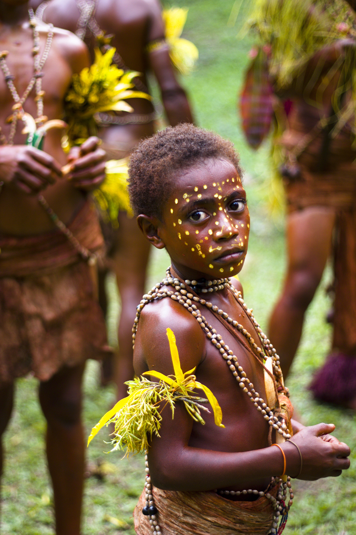 Face paint adds to the decoration and the young learn the traditional ways from their elders. Boys learn from the men of the village, as most of PNG's tribes are patriarchal.