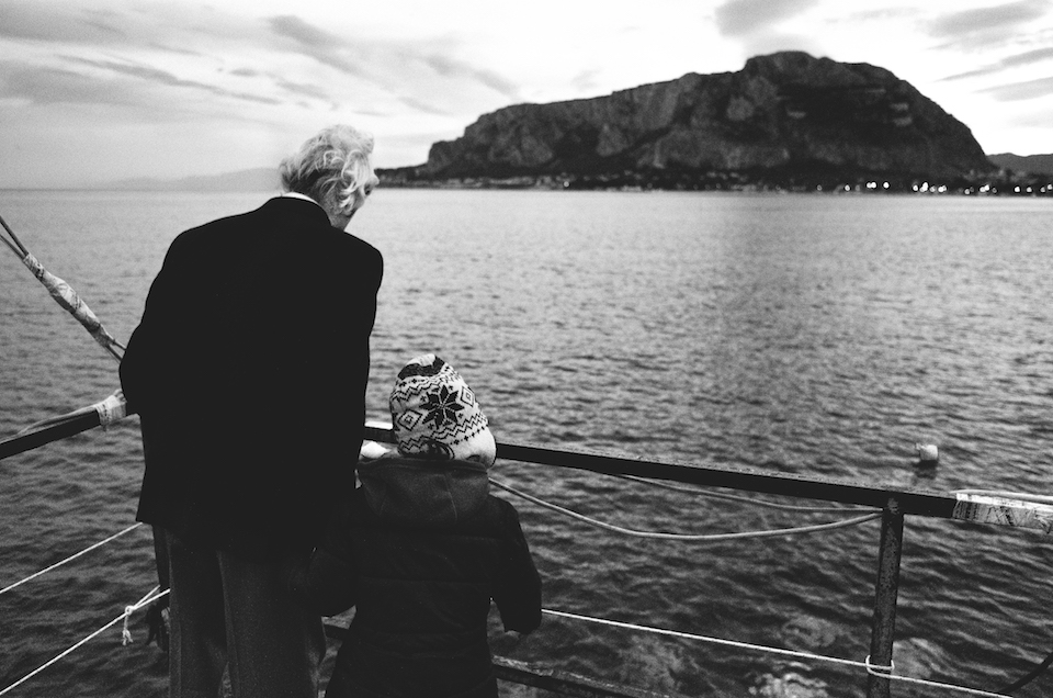 The grandfather and the grandaughter. The sea. She needs him, because he's going explain life to her.
