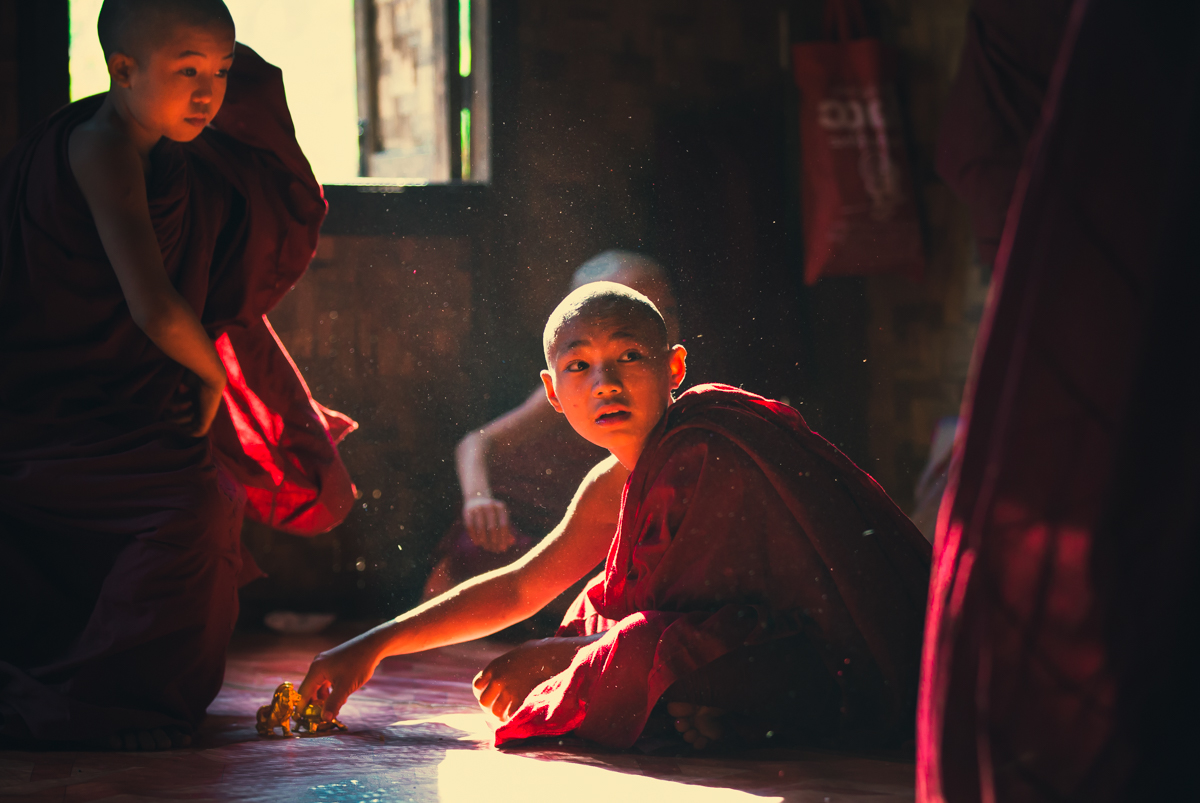Strangers rarely enter the dormitory of apprentice monks with monastery's high discipline and tight schedule. When we entered and started photographing, trying to stay low profile, the kids continued their games during a pre-lunch pause