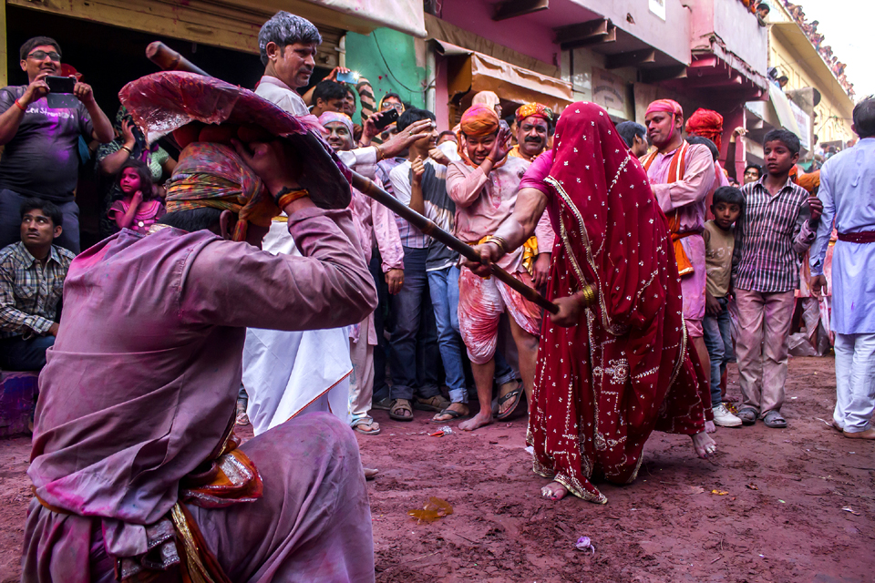 Men of Nandgaon, the birthplace of Krishna, come to play Holi with the girls of Barsana, but instead of colours they are greeted with sticks.