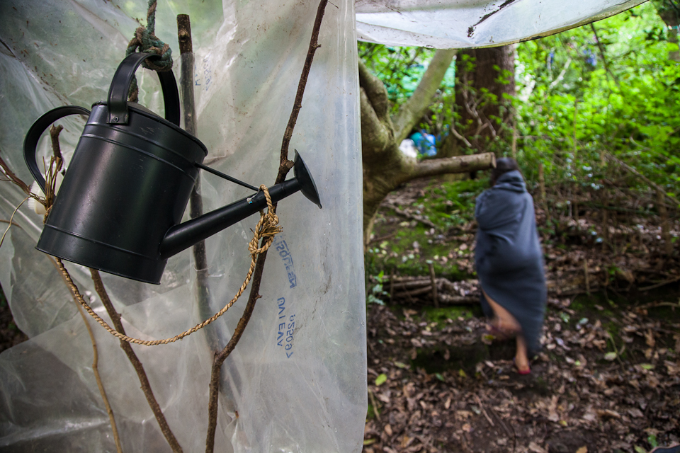 A watering can acts as a makeshift  shower at the end of a working day, June 2014. The smallholding is totally off-grid, so there is no running water.  Rainwater is collected in tanks and used for the vegetable garden and for the animals. Potable water, supplied by a nearby spring, is used for cooking, drinking and cleaning. In order to have a shower we would heat some water on a small gas stove and hang the can on a tree in the woods. Our family of three used around 20 litres of water per day which is less than the equivalent of flushing a regular toilet twice.
