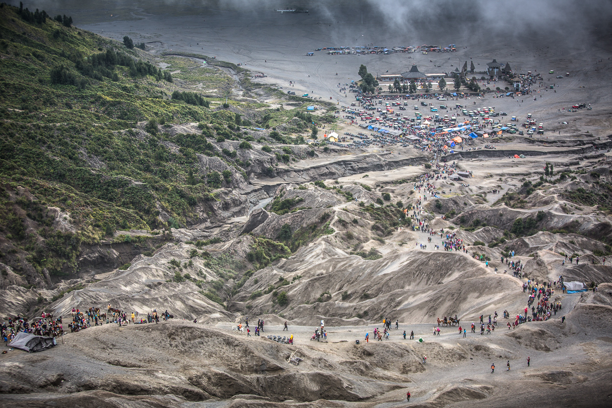 Pilgrimage. The Yadnya Kasada is a hindu festival held in Mt Bromo (Java, Indonesia). The crowds travel together up the mountain and throw offerings into the crater of the volcano.