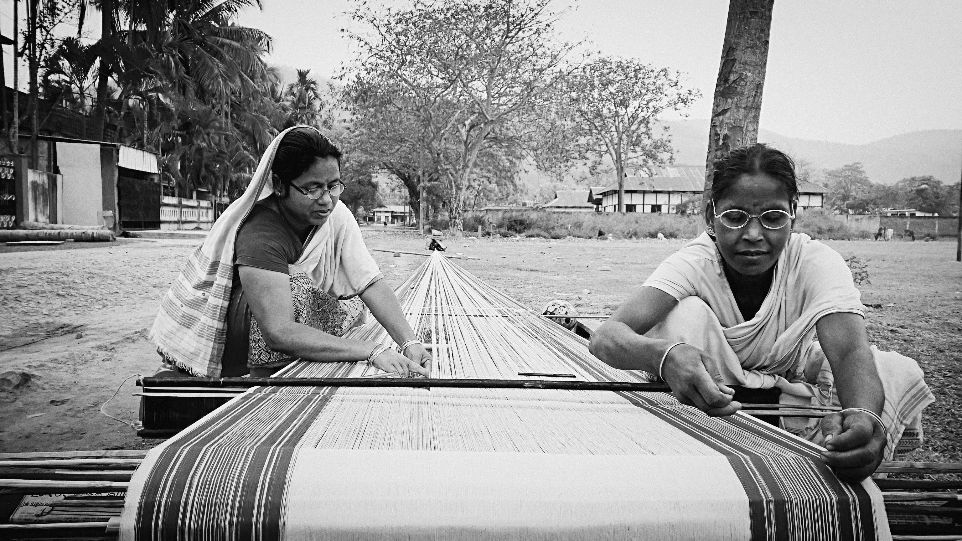 Weaving different types of traditional Assamese Gamocha(towel) has become a trademark business of Bharati and her mother-in law, Jyoti. In spite of their financial crisis and family problems, they came over to Kamrup and started weaving towels. They are now in a position of keeping number of workers under them and even send money to their village home.